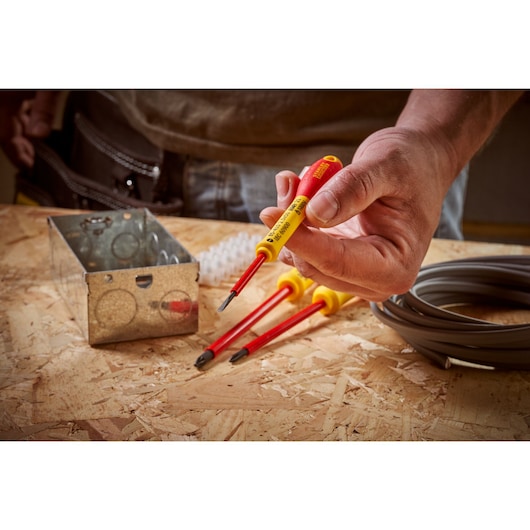 STANLEY® FATMAX® Insulated Slotted 2.5mm x 50mm Screwdriver Application Action Shot Hand/Person