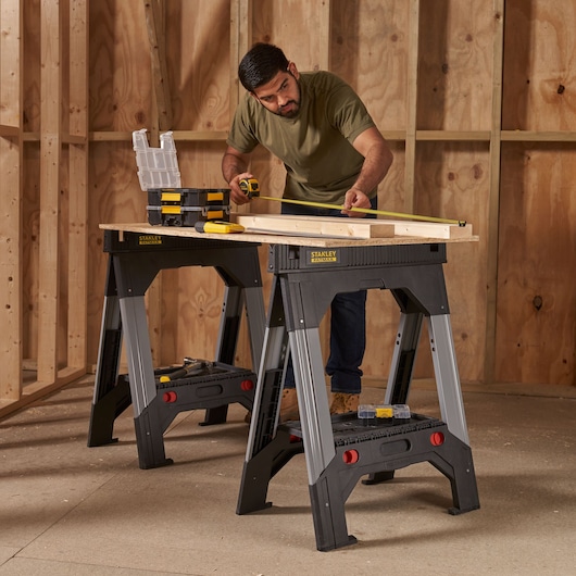 1-92-980 STANLEY® FATMAX® Folding Adjustable Height Metal Sawhorse (Pair), 1,135kg Max. Capacity, application image