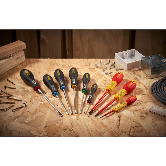 STANLEY® FATMAX® Slotted Flared 6.5 x 150mm Screwdriver Group Shot in a Workshop