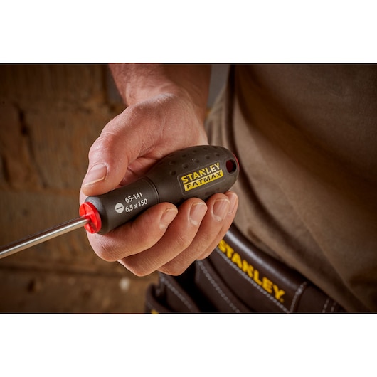STANLEY® FATMAX® Slotted Flared 6.5 x 150mm Screwdriver Application Action Shot Hand/Person